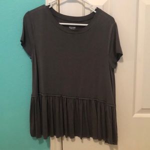 grey peplum style shirt